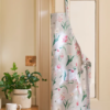 Sophie Allport at Gifted Boston Spa - Tulips Apron product photo hanging on a door
