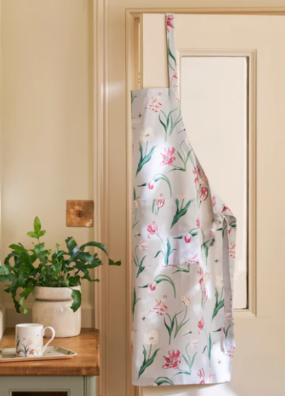 Sophie Allport at Gifted Boston Spa - Tulips Apron product photo hanging on a door